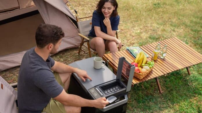 Couple camping with EcoFlow portable outdoor fridge