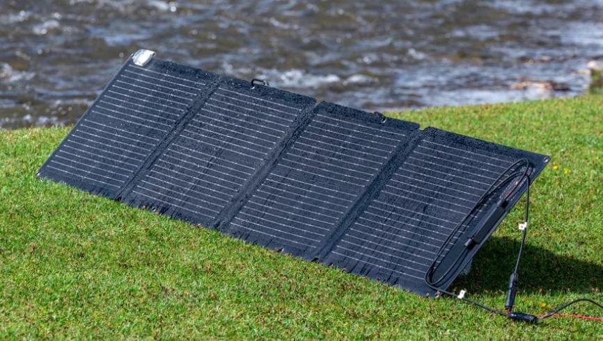 Portable solar panel by river