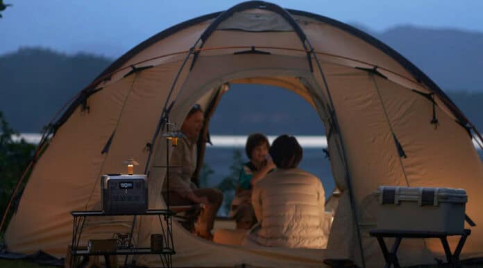 Family camping in tent